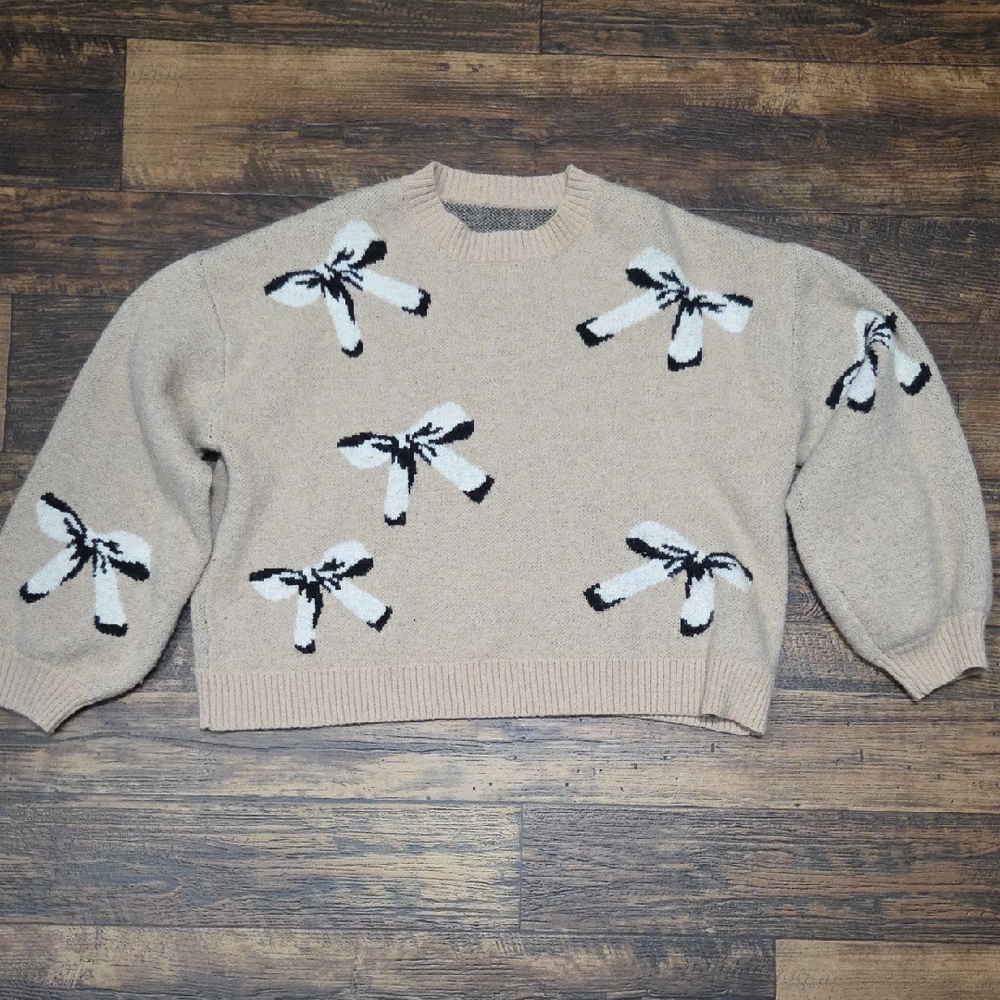 Chic Beige Sweater with Bow Accents